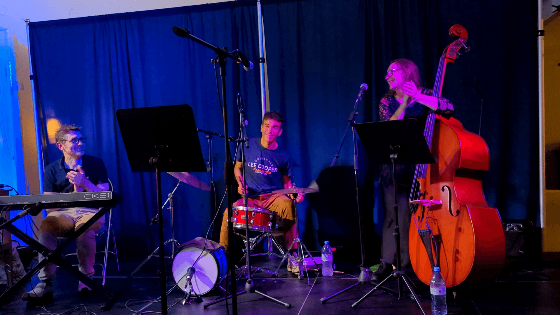 The house band together on stage